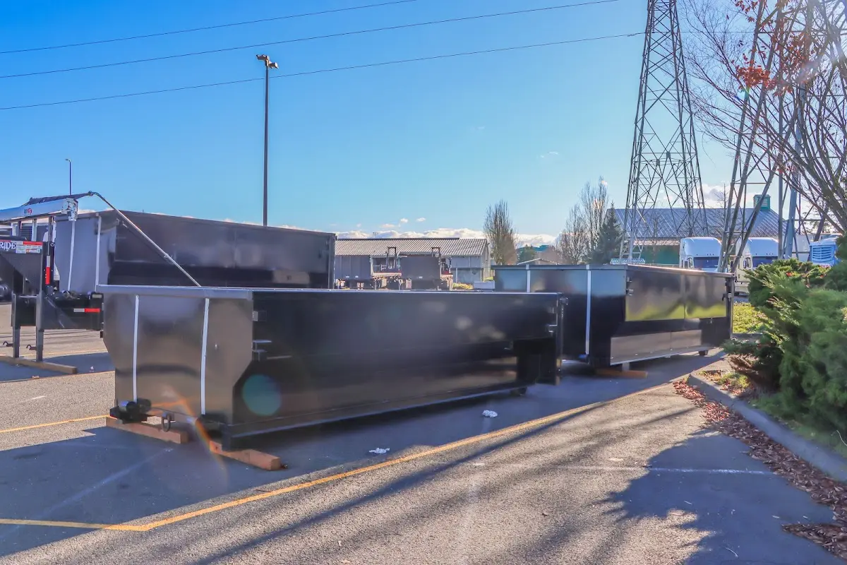 Roll-off dumpster ready for waste disposal at job site for Commercial Dumpster Rental in Monett